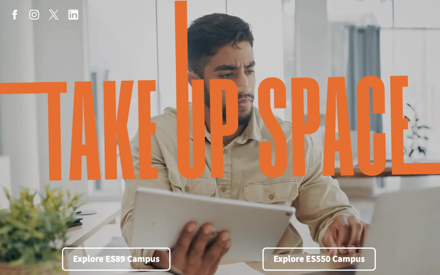 EqualSpace homepage with the words Take Up Space in tall orange letters over a photo of a member working on a tablet